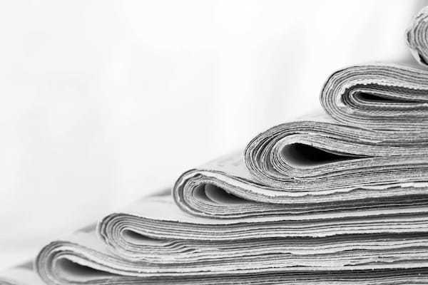 新聞の夕刊を廃止し経営合理化の一助に